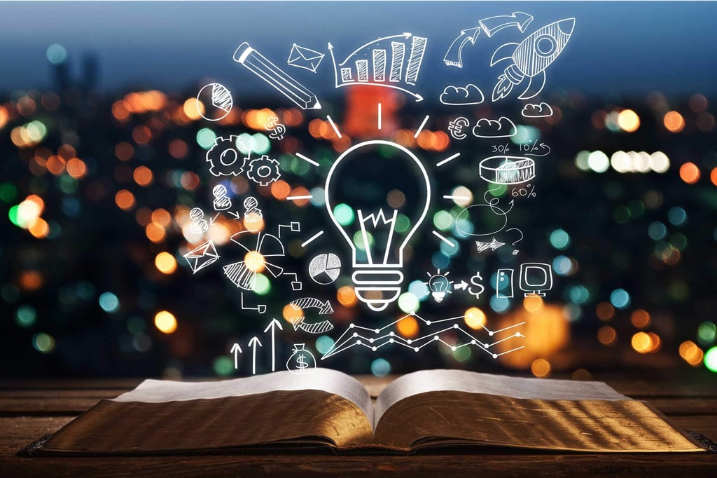 Book beneath lightbulb hologram