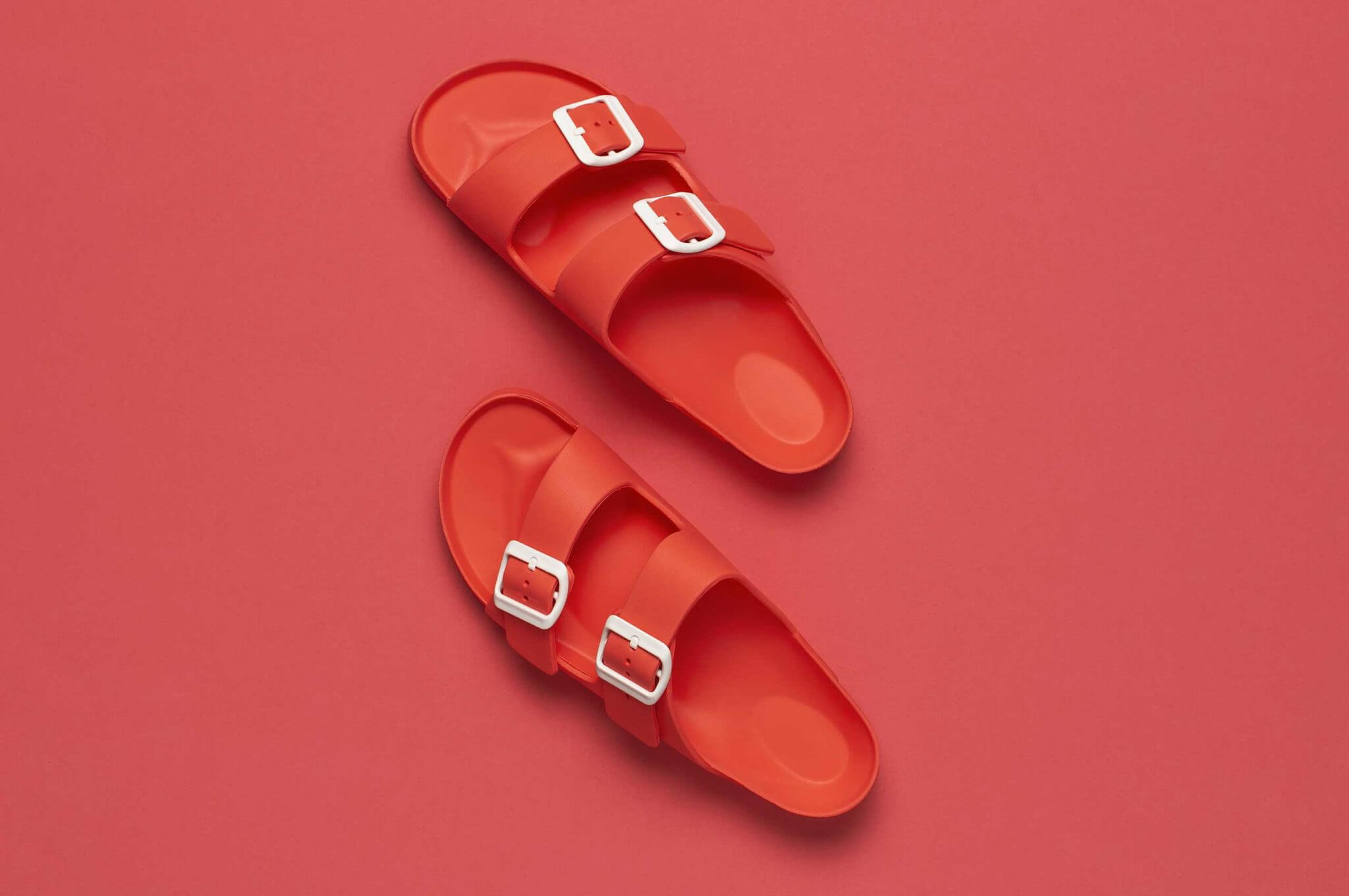 Pair of red Birkenstock slippers
