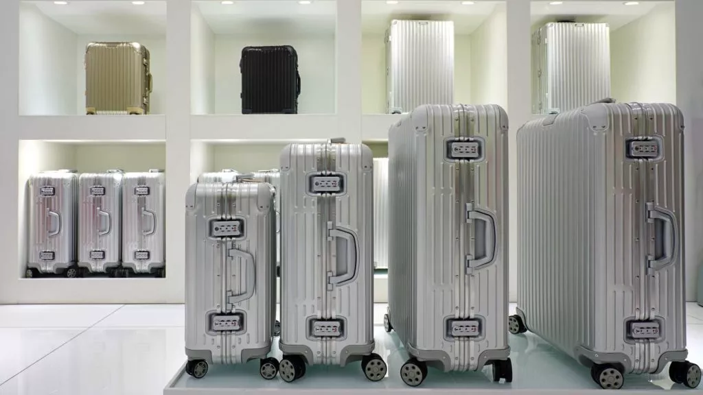 Silver Rimowa suitcases in a shop